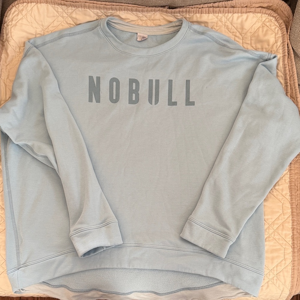 NOBULL Large women’s  Sky Blue Crewneck Sweatshirt- back side longer than front